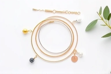 Flat lay of thin bracelets for stylish layering.