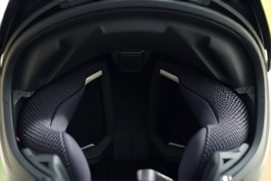 Inside of motorcycle helmet showing discreet in-helmet speaker system.