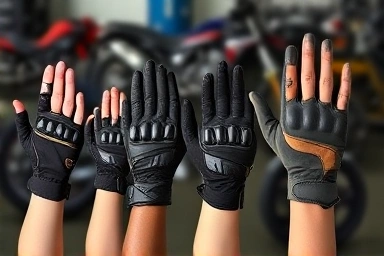 Diverse hands with perfectly sized motorcycle gloves.