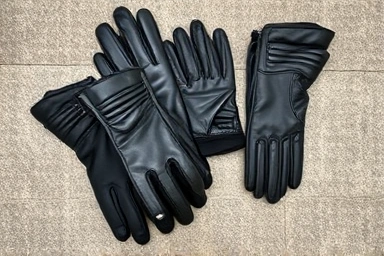 Variety of motorcycle riding gloves with touch-sensitive fingertips.