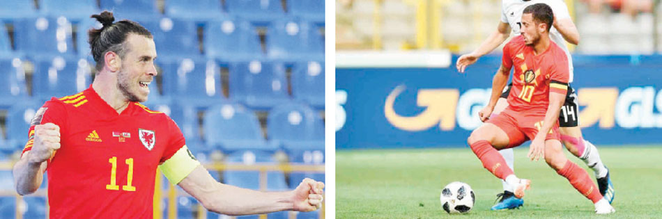 لاعب المنتخب البلجيكي إيدن هازارد ولاعب المنتخب الويلزي جاريث بيل -(أرشيفية)
