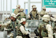 عربات عسكرية أميركية عند تقاطع في بغداد بعد احتلالها- (أرشيفية)