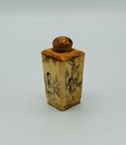 Bone snuff bottle decorated with ladies in garden settings., 1900-1950,