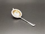 833/1000 silver tea strainer with German Crown and Moon hallmark, 833/1000 purity mark and silversmith&#39;s mark for Beckh &amp; Maichhofer (Pforzheim, 1888) and rebranded with a Portuguese Javali (Boar) II (Lisbon, 1887-1937) hallmark. 20g, , 1888-1939