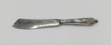 German silver cake knife with relief and engrave decor. 833/1000 silver. Certified content mark and later hallmarked with Javali do Porto (Portugal, 1887-1937). 82g., 26 cm, 19th/20th century - séc. XIX/XX