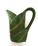 Jug in faiance with inspiration in Banana leaves from Madeira. Capacity of 1,7L, weight of 0,965kg., 11x23x26cm,