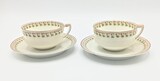 Conjunto de 12 chávenas e 12 pires em porcelana &quot;casca de ovo&quot; Limoges. Marcadas &quot;Frank Havilland - Limoges&quot; e &quot;Martins Sucessores - Coimbra&quot;. Ligeiro desgaste dos dourados., 4,5 x 10,5 cm (cup/chávena), 20th century (1st half) - séc. XX (1ª metade)