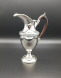 Milk jug with a carved rosewood handle. Queen Maria of Portugal style. Eagle hallmark (Lisbon, Portugal). Prata 833/1000. 408g., 20,5 cm, 1938-1984