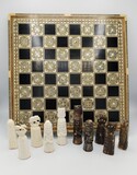 Egyptian chess set with a Khatam technique board with mother of pearl inlay and wood marquetry. Carved and stained stone pieces. Bishop is replaced by elephants., 39x39cm (board, tabuleiro), 20th century - séc. XX