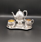 Small german coffee set made of tray, coffee pot, milk jug and sugar bowl. 800/1000 silver (continental silver). With german marks (Moon and Crown) and purity mark for 800. Silversmith&#39;s or seller&#39;s mark for L. Posen, Frankfurt (1869-1938) and silversmith&#39;s mark for Wilkens &amp; Sohne, Bremen (since 1890). 766g., 21cm (tray/tabulei... 1869-1938