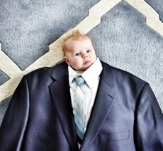 Small baby growing into a full size suit - future fitting for anticipated growth