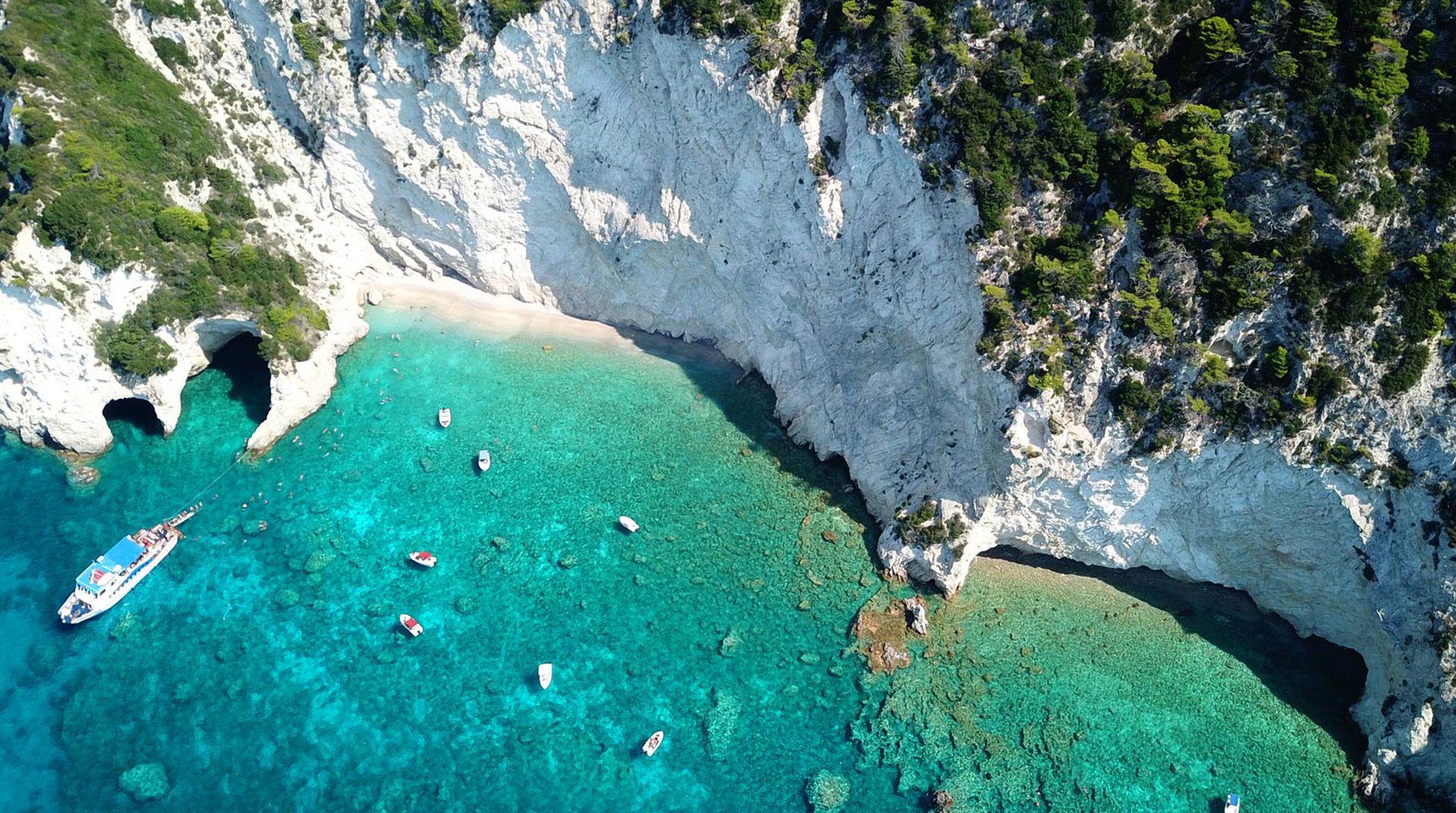 Beach in Zakynthos island. White rocks and crystal blue water.