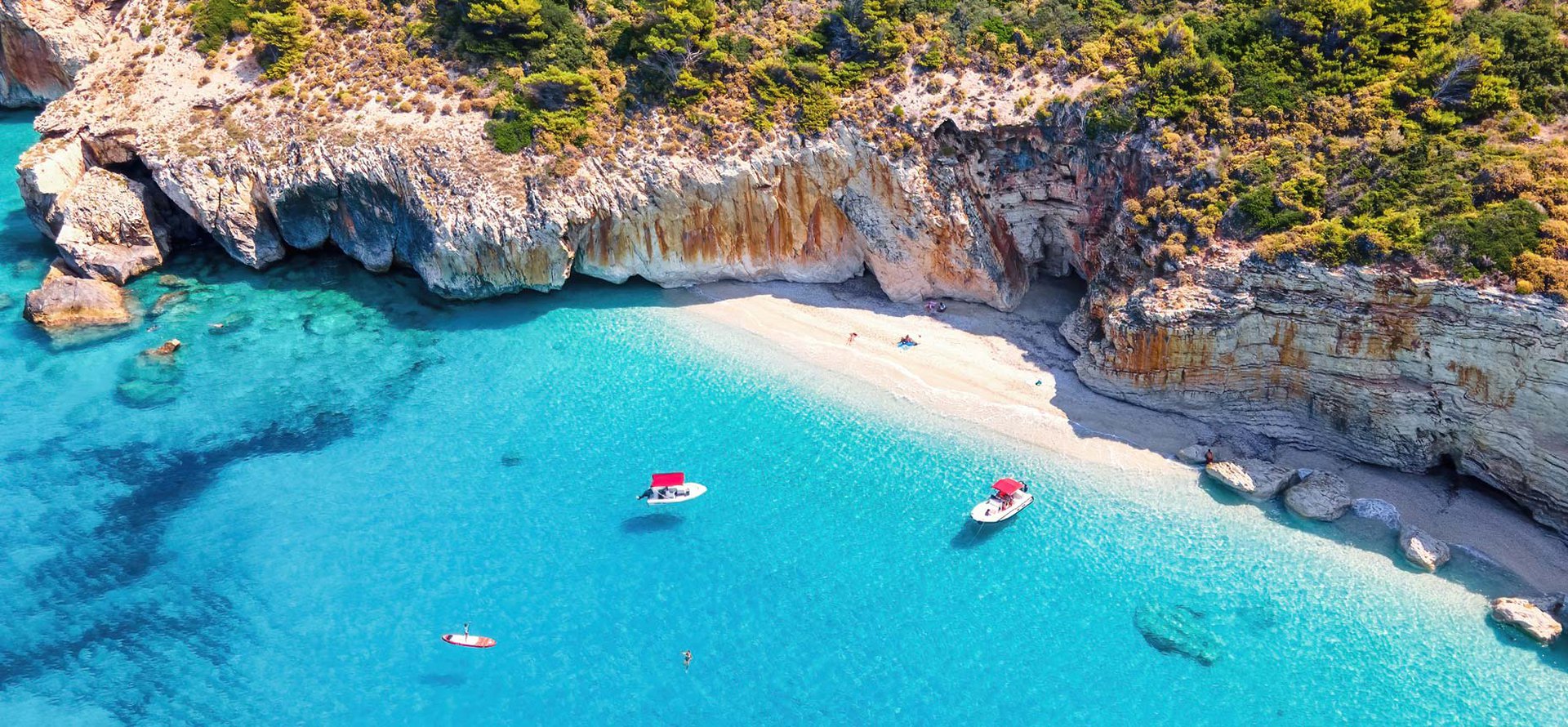 Beach in Zakynthos island. White rocks and crystal blue water.