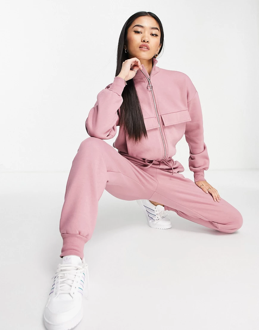 ASOS DESIGN brushed fleece half zip jogger jumpsuit in dusky rose-Pink