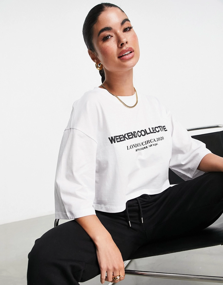 ASOS Weekend Collective cropped t-shirt with 90s logo in white