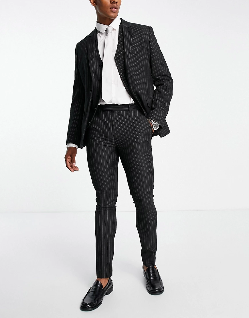 ASOS DESIGN skinny suit trousers in black pinstripe