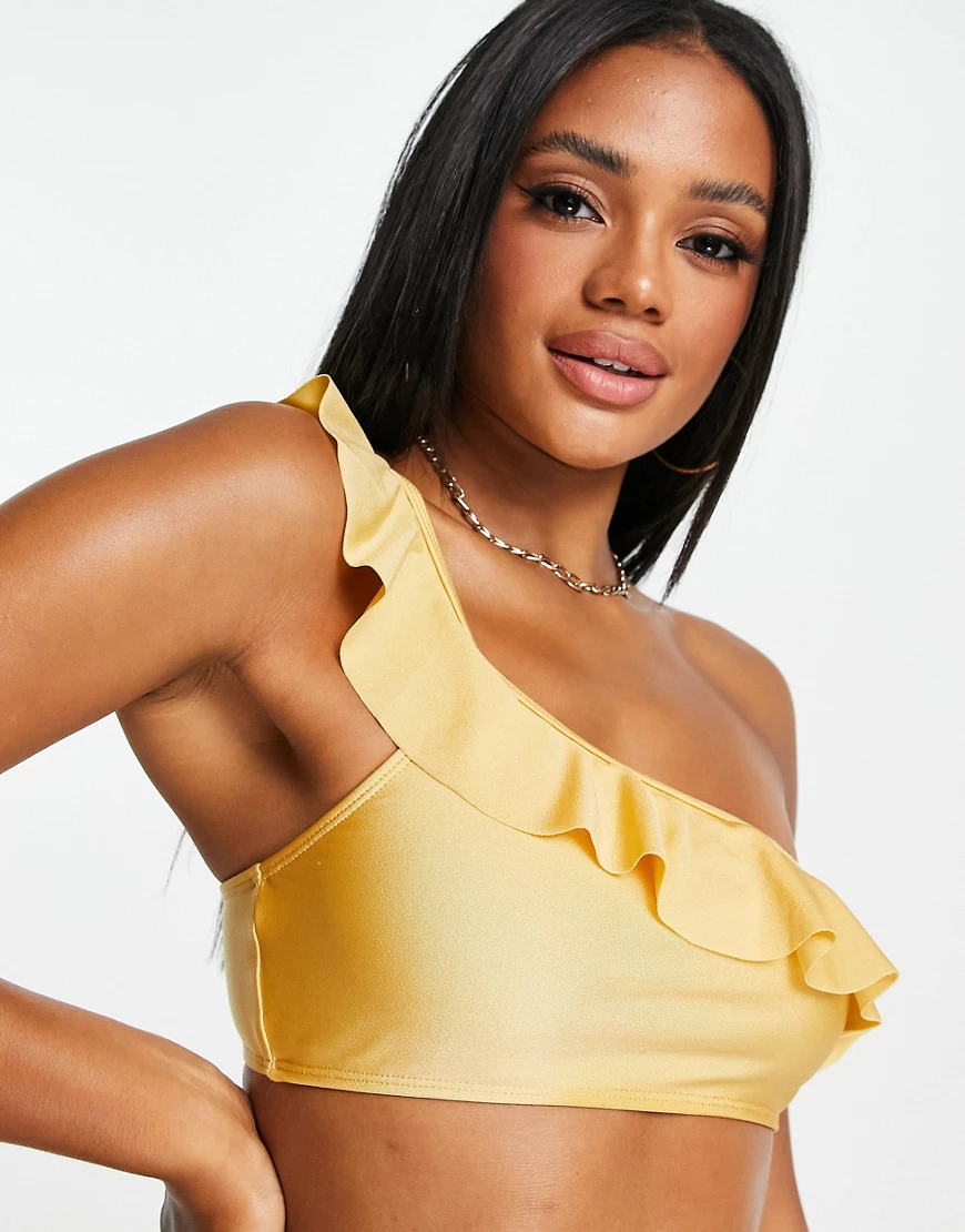 NA-KD frilly one shoulder bikini top in gold