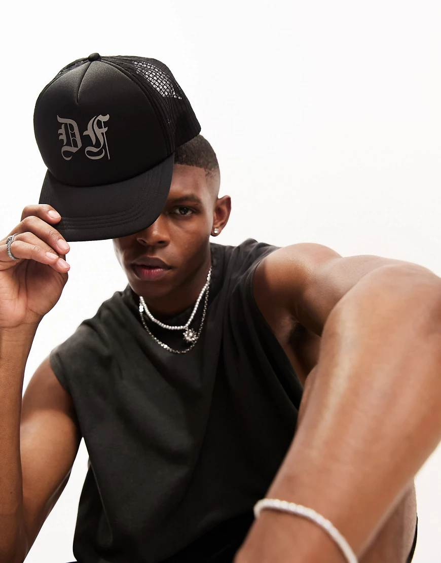 ASOS Dark Future trucker cap in black