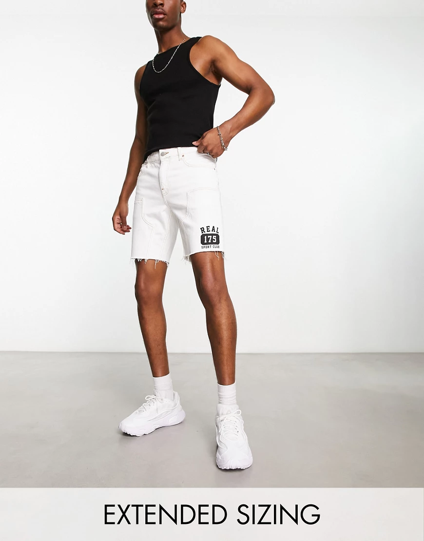 ASOS DESIGN classic rigid regular length shorts in white with varsity print