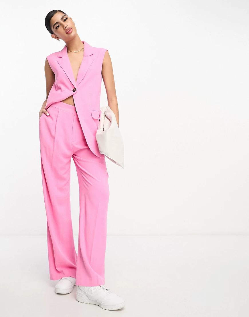 ASOS DESIGN linen relaxed trousers in pink