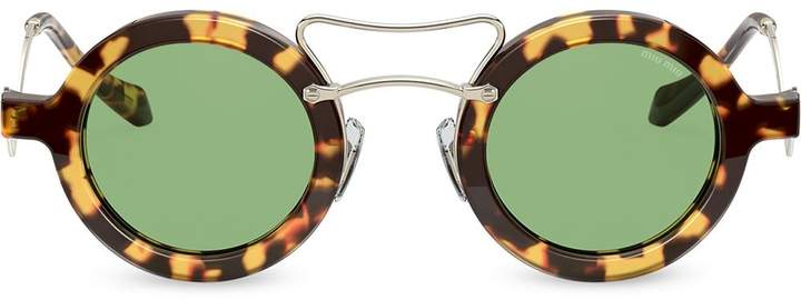 Miu Miu Eyewear tortoiseshell round sunglasses