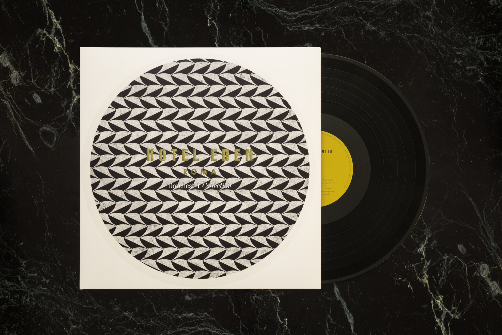 Vinyl record with illustrated cover, featured as part of a branding project for Hotel Eden by & Smith.