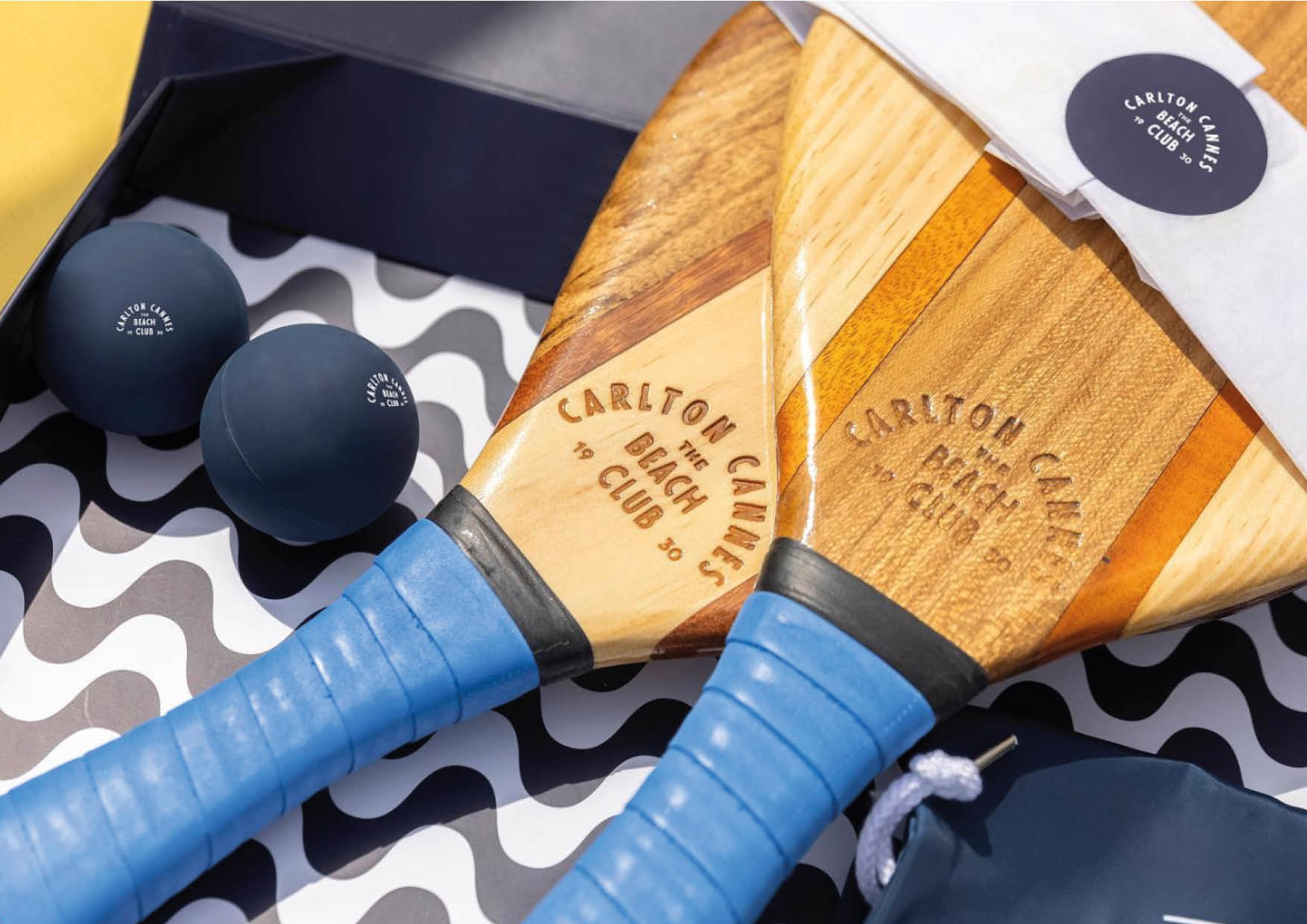 Two squash racquets designed by & Smith for Carlton Beach Club.