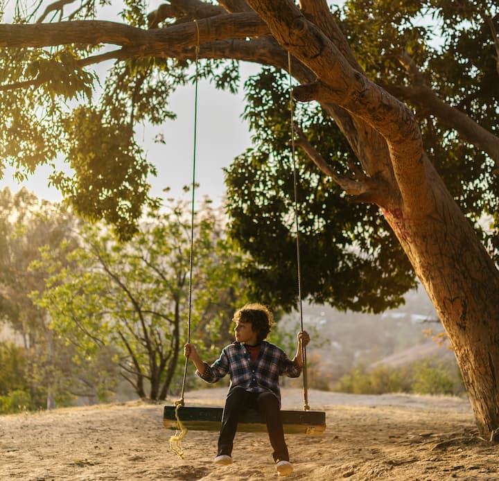 Young kid Swinging