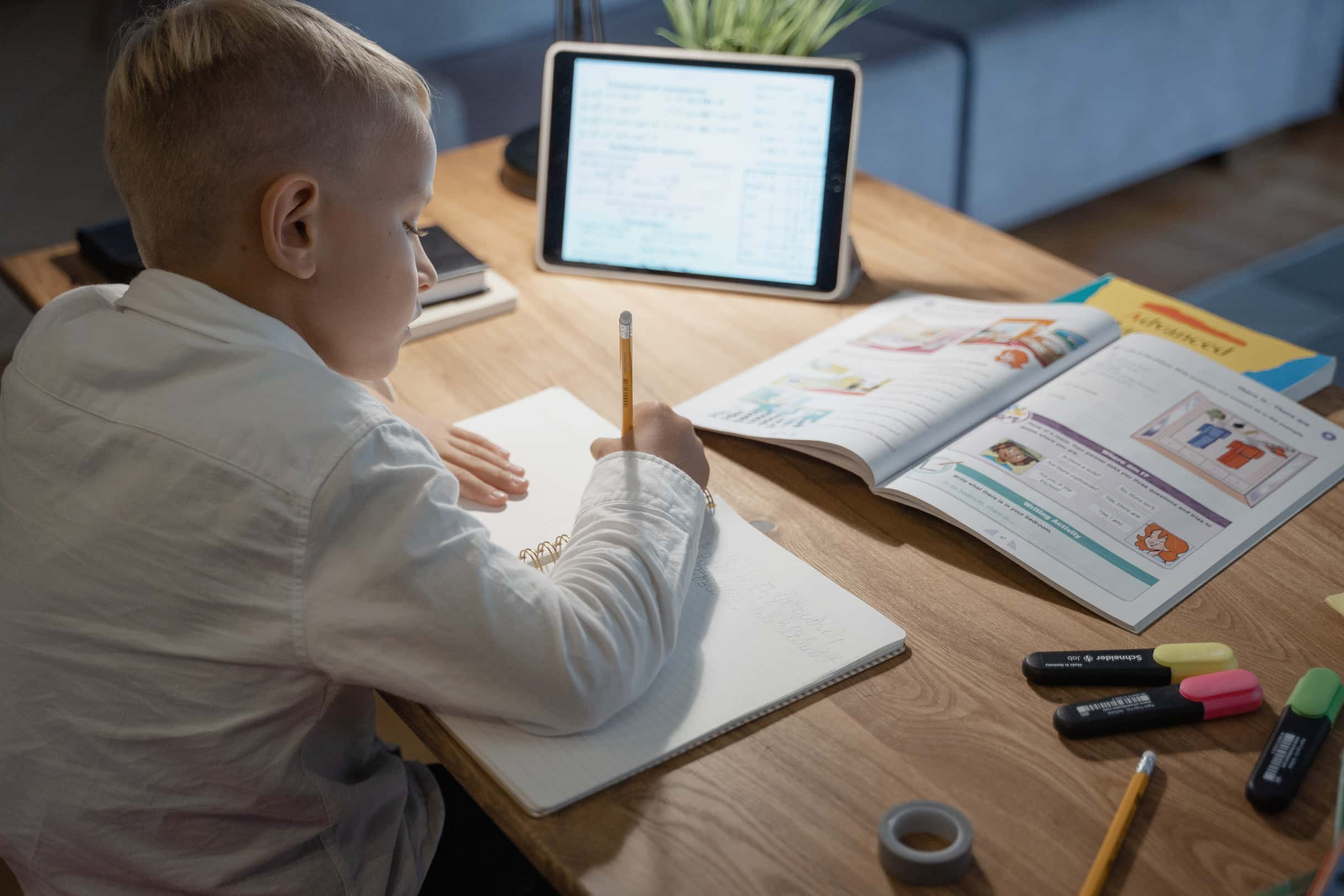 Student taking extra remote classes at home