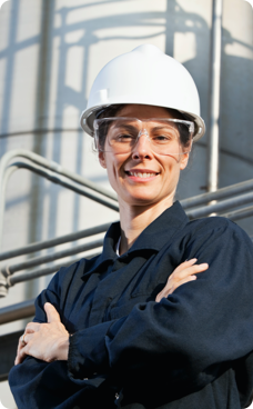 a woman wearing blue uniform and white helmet