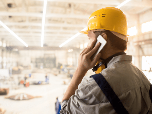 construction man talking on the phone