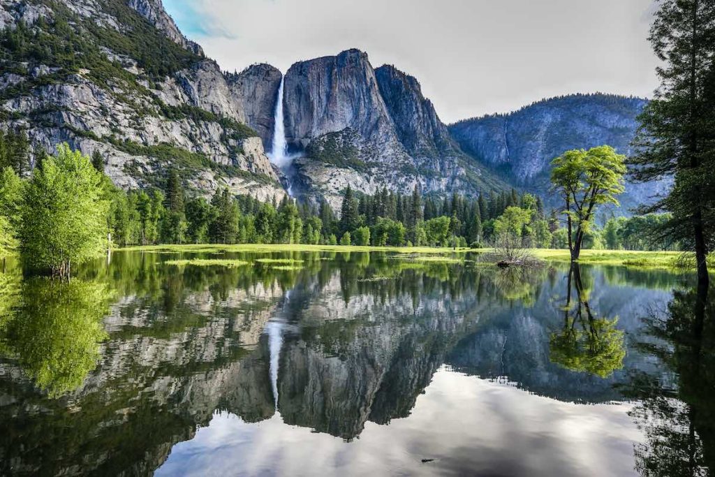 Photo of famous waterfall and lake in Yosemite National Park