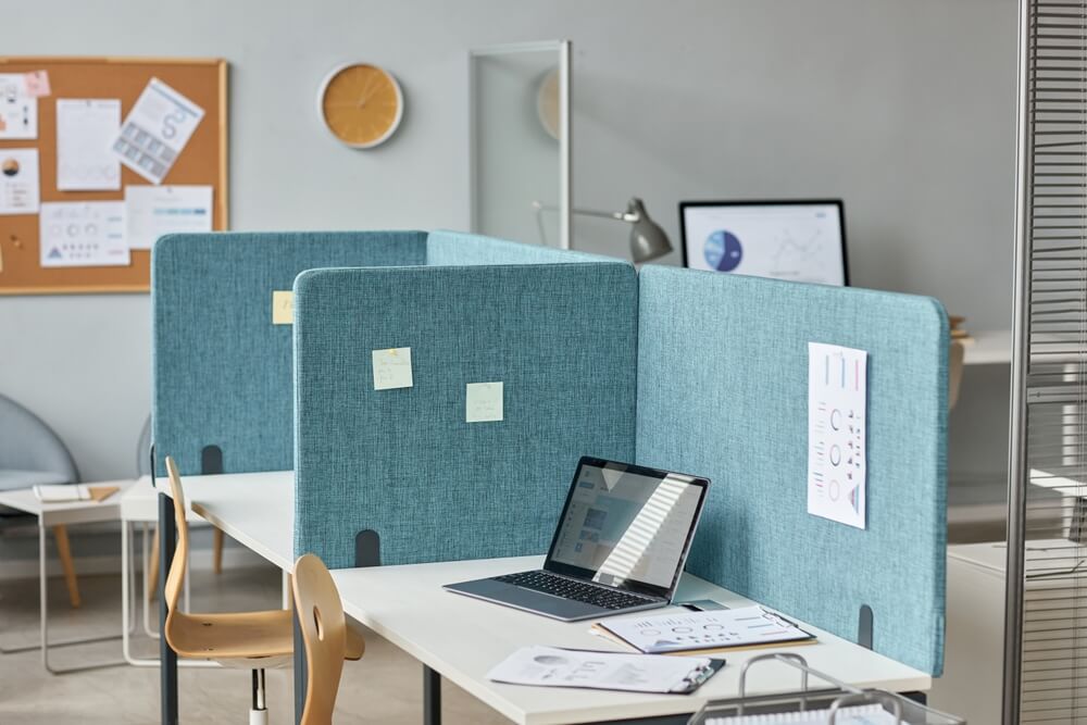 Empty cubicles representing a call center