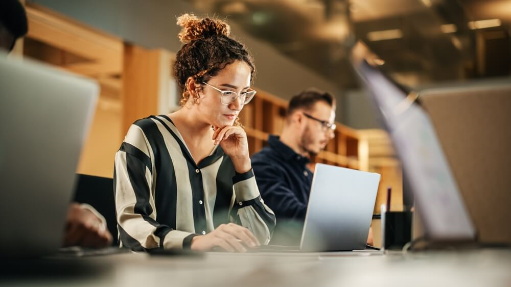 A woman working on her laptop