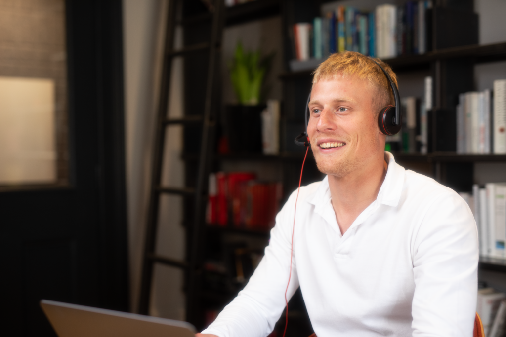 Smiling virtual receptionist with headset
