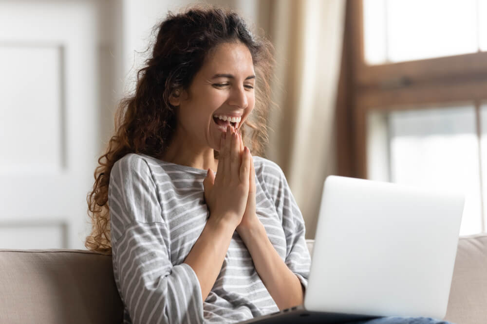 Happy women looking in the screen