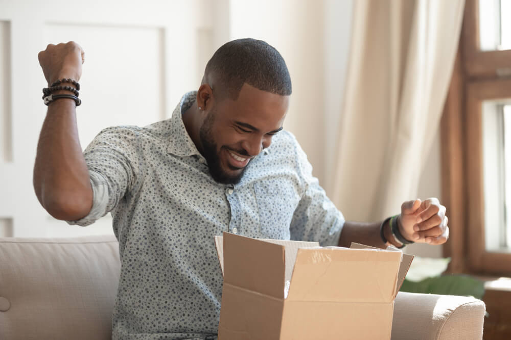 Man happy after receiving his parcel 