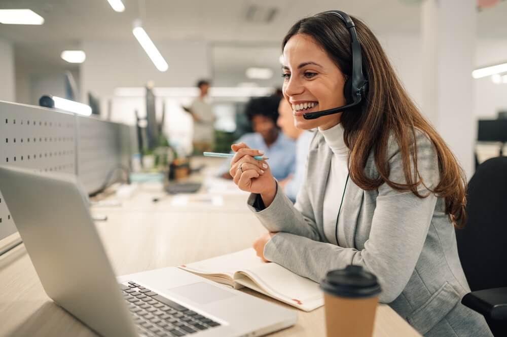 smiling women taking the calls