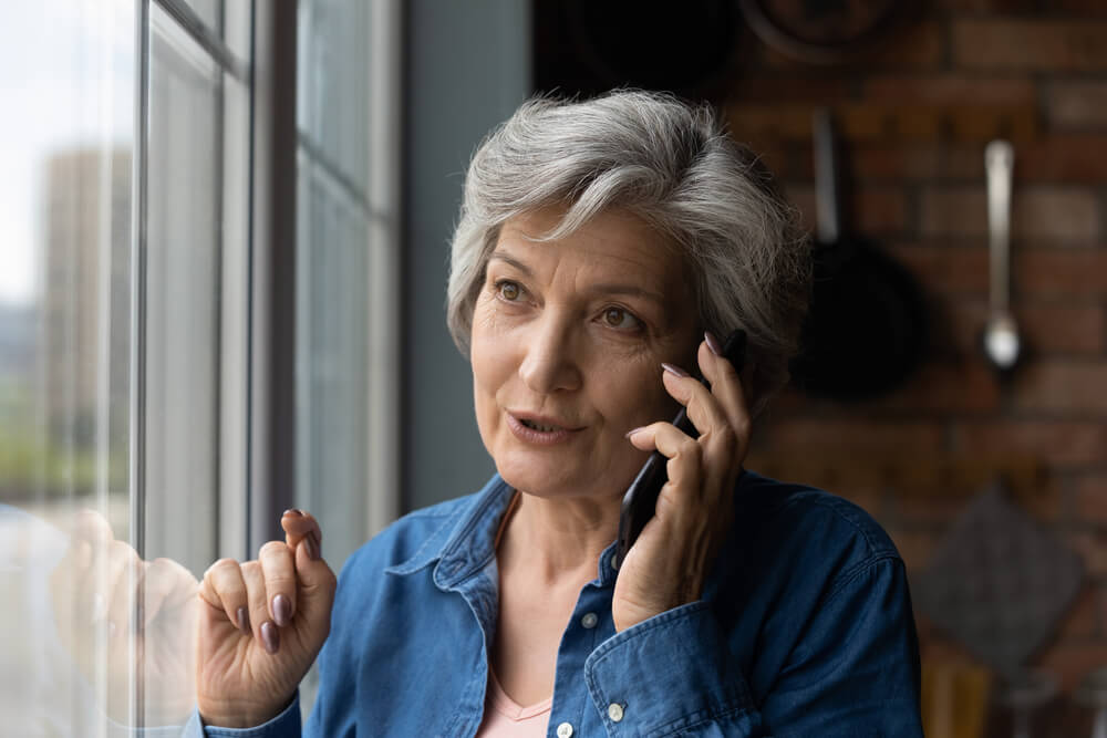 Old women talking on the phone 