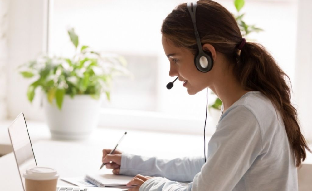 virtual receptionist on a call with customer. 