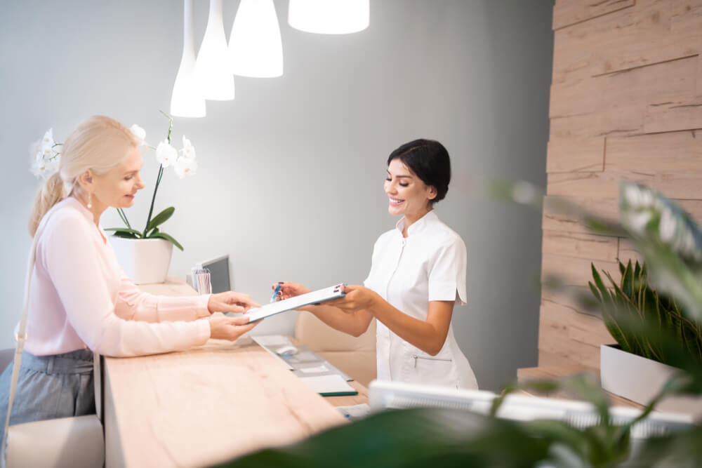 nurse helping a patient