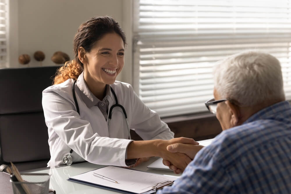 nurse talking to a patient 