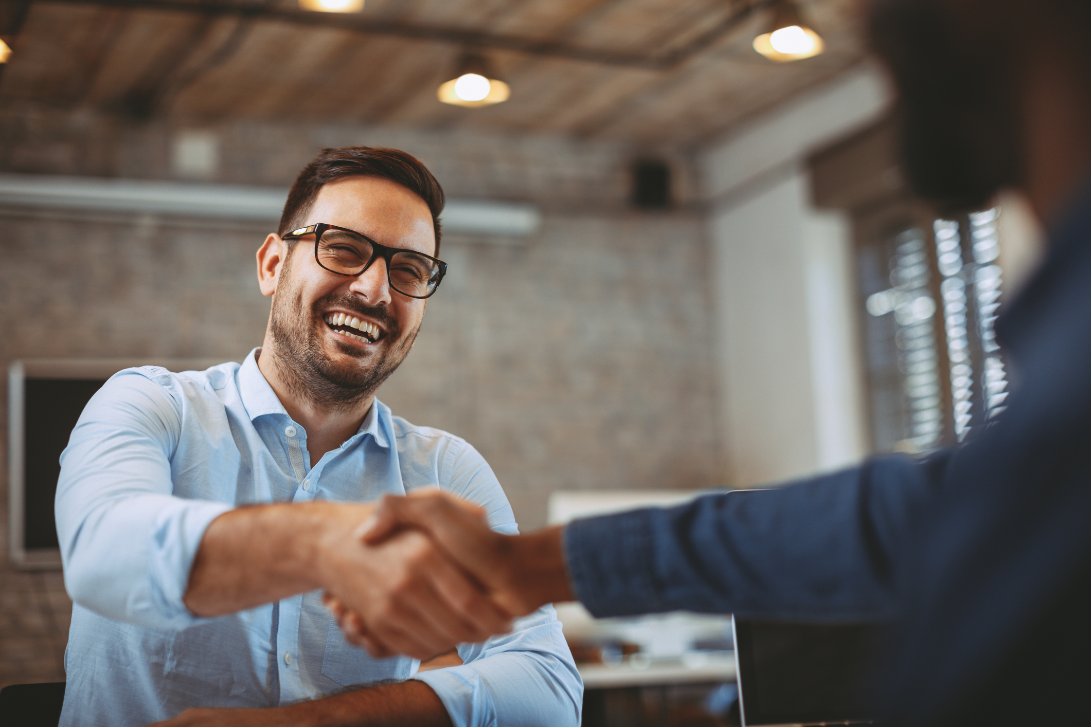 man doing handshake