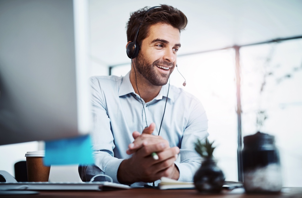 Man speaking to callers as part of lead qualification answering service