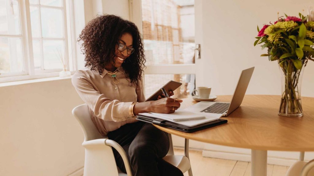 Smiling woman talking to different brands via omnichannel support