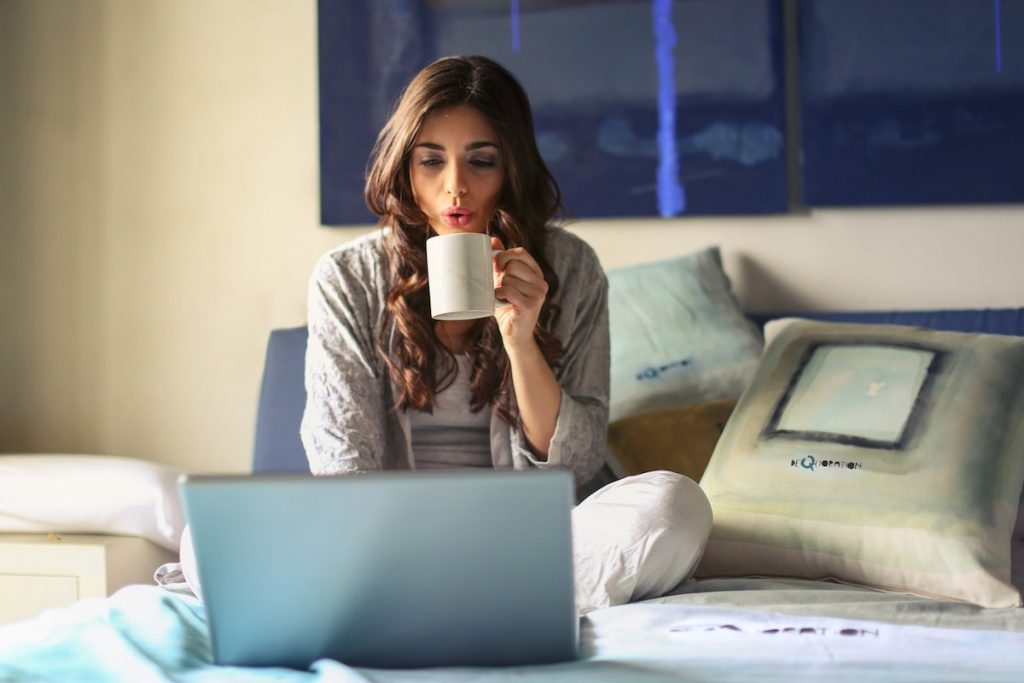 Woman checking messages from her lead qualification service