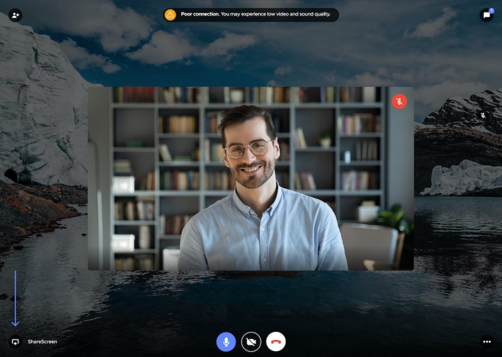 Smiling man on Teleport.Video call with 'ShareScreen' button highlighted