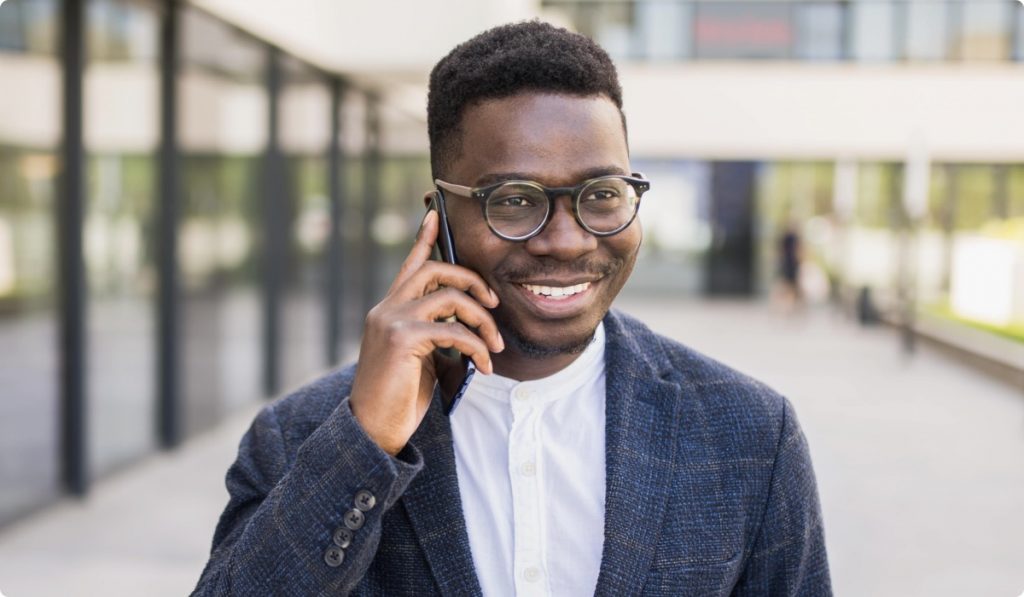 Smiling man on smartphone