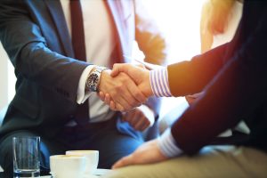 Two people shaking hands