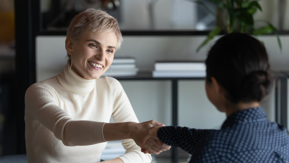 two people shaking hand